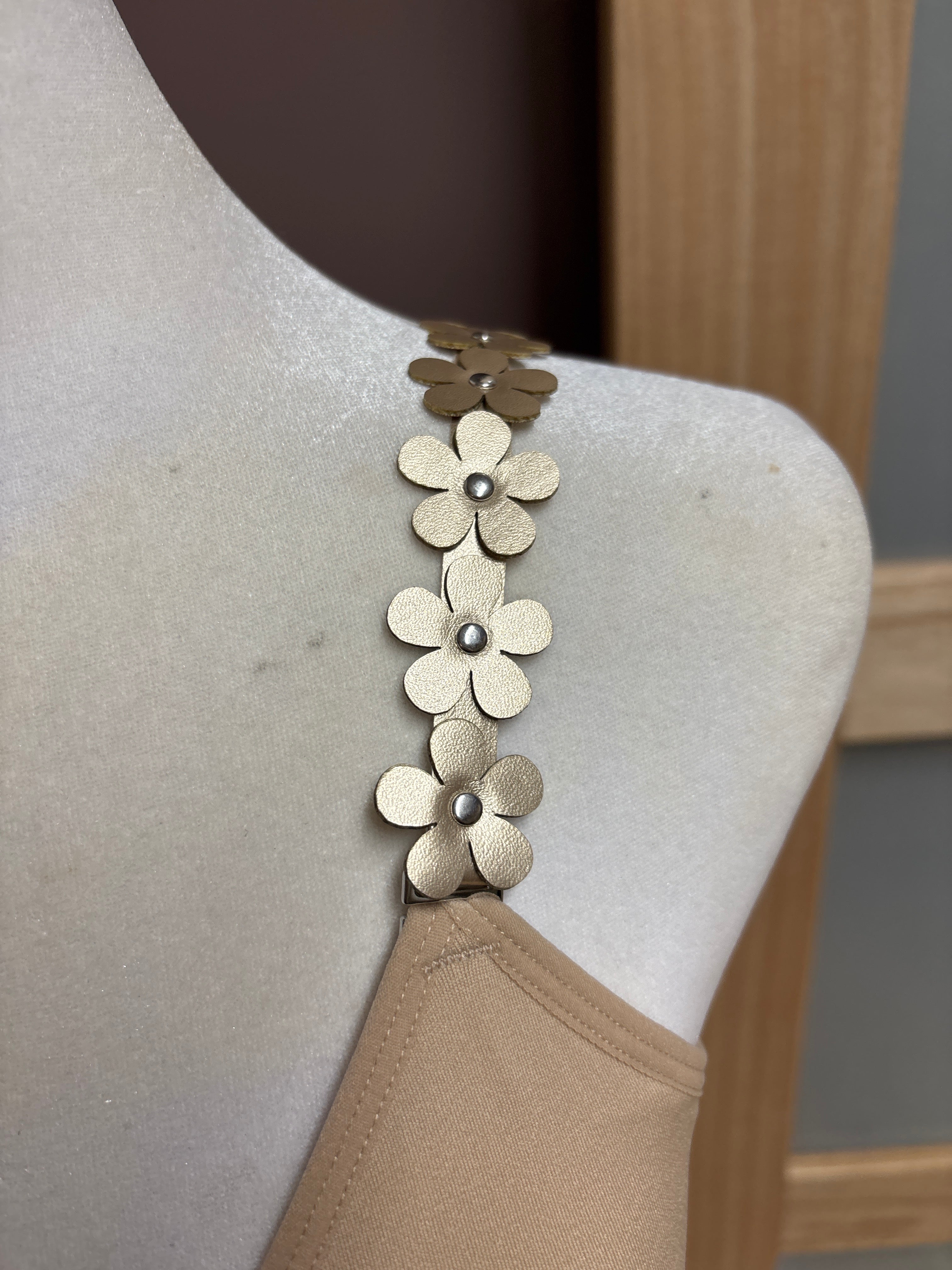 Strap-it’s- Nude plunge bra with vegan leather flower straps