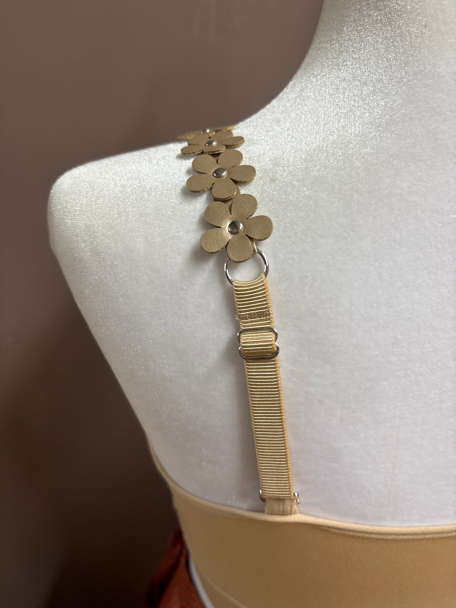 Strap-it’s- Nude plunge bra with vegan leather flower straps
