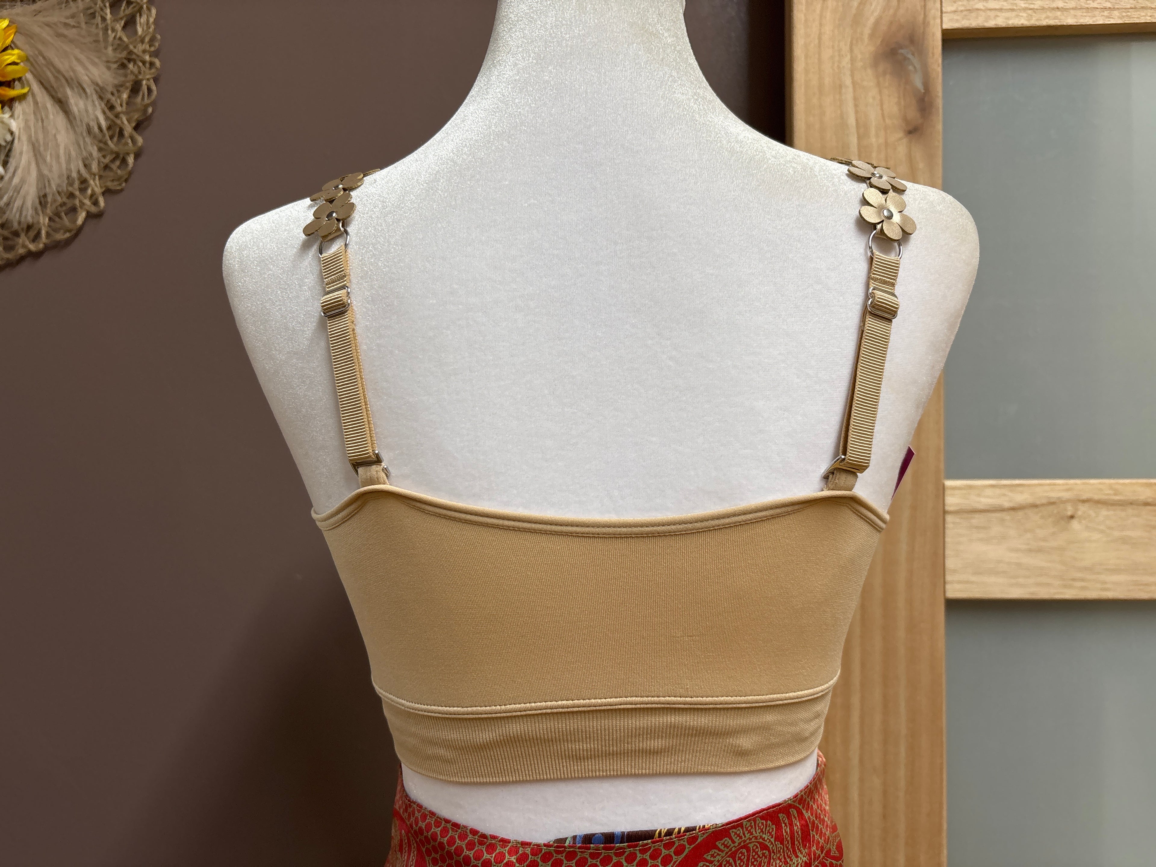 Strap-it’s- Nude plunge bra with vegan leather flower straps