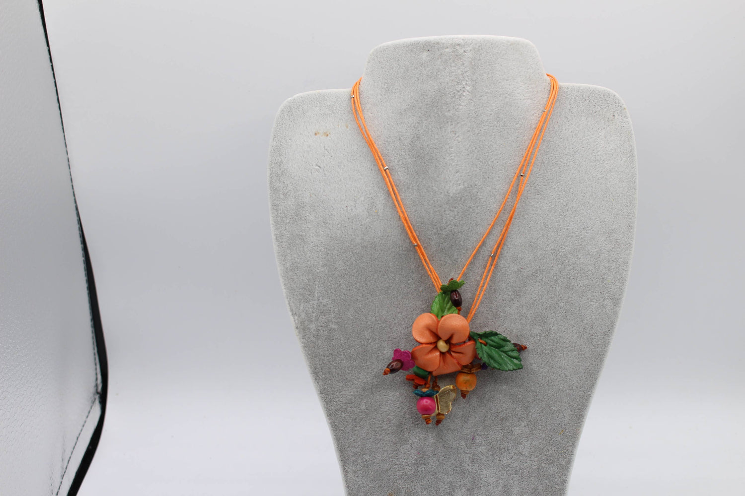 Leather flower necklace with wood beads